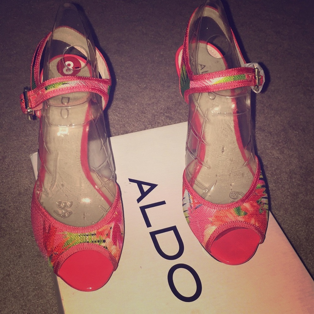 Never worn and with box heels